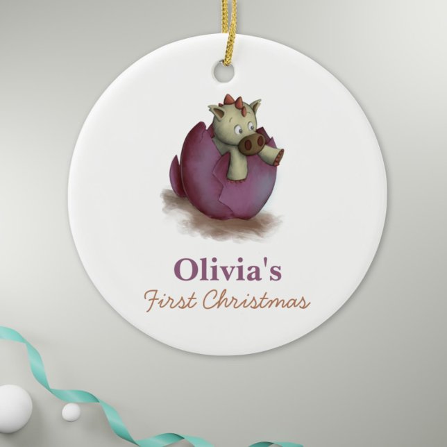 Purple Dinosaur Hatching Baby Girl First Christmas Ceramic Tree Decoration (Baby girl first christmas ornament with a dinosaur hatching illustration)
