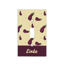 Purple eggplants on yellow