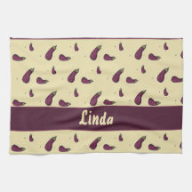 Purple eggplants on yellow