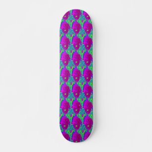 purple face on green skateboard