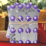 Purple Fancy Christmas Ornament Wrapping Paper<br><div class="desc">Wrap your holiday gifts with simple yet elegant Purple Fancy Ornament Wrapping Paper. Wrapping paper design features a purple fancy ornament against a grey gradient background adorned with falling snowflakes. Additional gift and holiday items available with this design as well.</div>