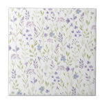 Purple Floral Ceramic Tile<br><div class="desc">Bring a breath of fresh air into your space with this soft purple floral design, featuring a delicate scatter of lavender, lilac, and soft blue blossoms intertwined with gentle green foliage. The airy, hand-painted look creates a calm, romantic feel reminiscent of a quiet spring meadow - perfect for brightening your...</div>