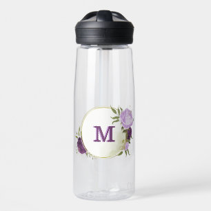 purple flowers green leaves  water bottle