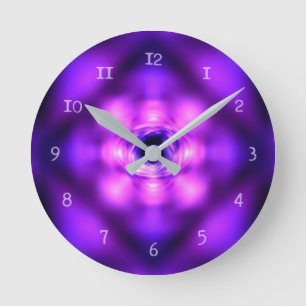 Purple glowing atom round clock