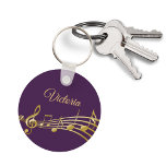 Purple gold music notes monogram name key ring<br><div class="desc">Simple and elegant for a music lover! Feminine purple background with faux gold music notes. Template for your name,  golden hand lettered style script.</div>