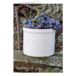 purple grape bunch in old crock stoneware