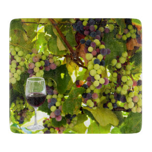 Purple Grapes Growing on the Vine with Wineglass Cutting Board