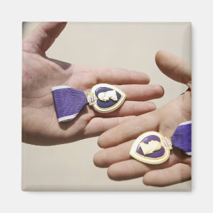 Purple Heart recipients display their medals Magnet