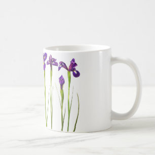 Purple irises isolated on a white background coffee mug