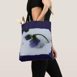 Purple pansy on the snow tote bag