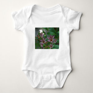 Purple pink white striped orchid like flower lilly baby bodysuit