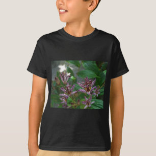 Purple pink white striped orchid like flower lilly T-Shirt