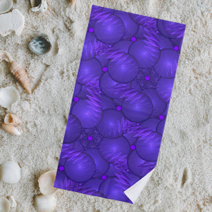 Purple planets and lightnings beach towel