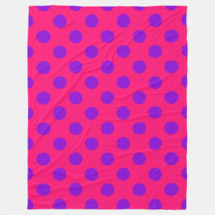 Purple polka dots on cerise fleece blanket