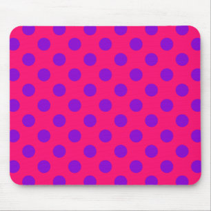 Purple polka dots on cerise mouse mat