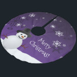 Purple Snowman Winter Scene Christmas Tree Skirt<br><div class="desc">Add a whimsical touch underneath your Christmas tree this holiday season with a Purple Snowman Winter Scene Christmas Tree Skirt. Tree Skirt design features a happy snowman in a snowy wintry scene against a purple background adorned with matching colour snowflakes. Additional gift and holiday items available with this design as...</div>