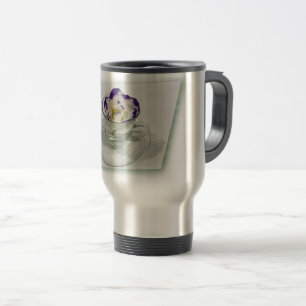 Purple white flower in a cup