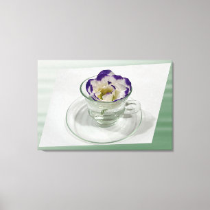 Purple white flower in a cup canvas print