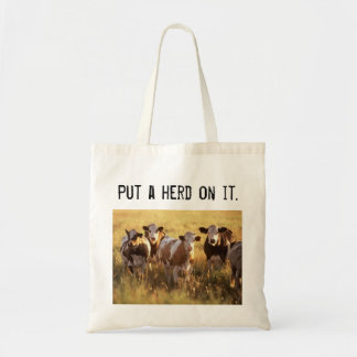 Put a herd on it. tote bag
