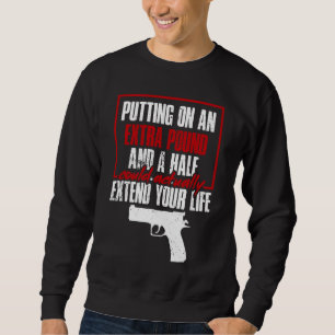 Putting On a Pound Concealed Carry Shooting Appar Sweatshirt