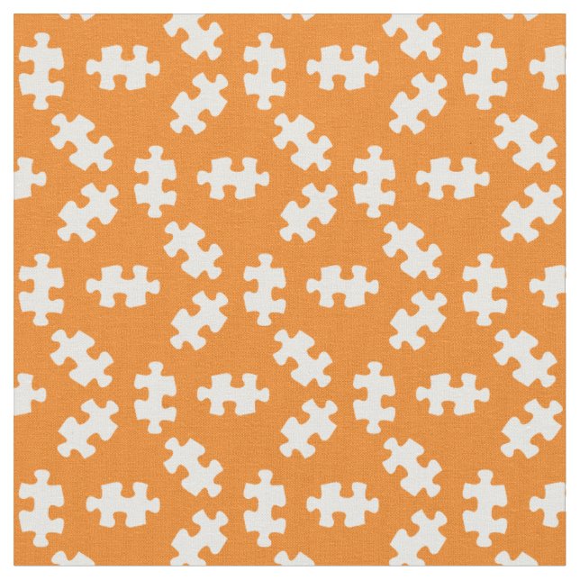 Puzzle Pieces Orange and White Fabric (Close Up)