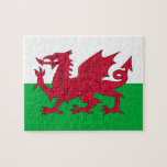 Puzzle with Flag of Wales<br><div class="desc">Embark on a puzzling adventure while celebrating Welsh heritage with our captivating puzzle featuring the flag of Wales. Crafted with precision and attention to detail, this puzzle is not just a fun activity but also a tribute to the rich culture and history of Wales. Immerse yourself in the iconic imagery...</div>