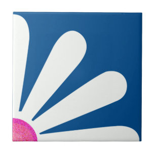Quarter of white daisy, pink centre on lapis blue tile