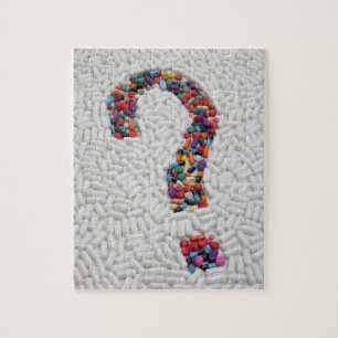 Question mark of pills on white pill background jigsaw puzzle