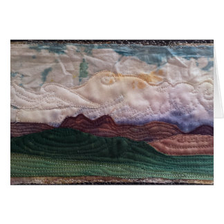 Quilted landscape hills and sky