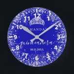 Quinceanera royal blue silver glitter tiara name round clock<br><div class="desc">For an elegant Quinceañera,  15th birthday.  A trendy royal blue background colour. Decorated with faux silver glitter dust, a tiara crown. Personalise and add a name,  age and a date. Quinceañera is written with a modern hand lettered style script with swashes.</div>
