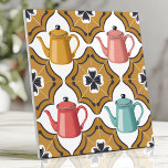 Quirky 1950s Kitsch Design with Playful Teapots Tile<br><div class="desc">Add a touch of retro charm to your space with this quirky 1950s-inspired kitsch tile. Featuring playful teapots in coral red, mustard yellow, and turquoise, framed by atomic boomerangs and funky black and white floral accents, this tile exudes fun and nostalgia. Perfect for creating unique backsplashes, accent walls, or vintage-inspired...</div>