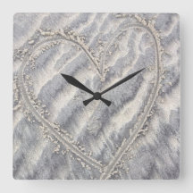 Quirky heart drawing in the sand square
