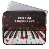 Quote on Piano Keys with Rose Petals