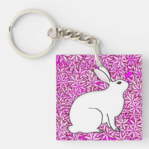 Rabbit on a bed of spring flowers key ring