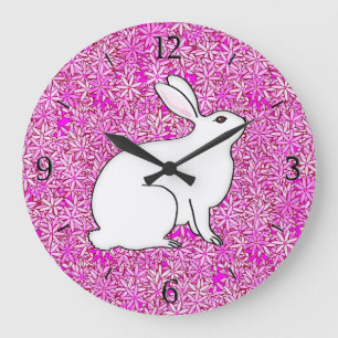 Rabbit on a bed of spring flowers large clock