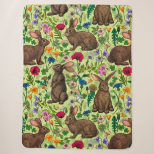 Rabbits and wildflowers on honeydew green sherpa blanket