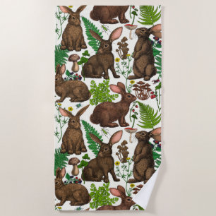 Rabbits and woodland flora 4 beach towel