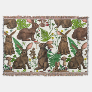 Rabbits and woodland flora 4 throw blanket