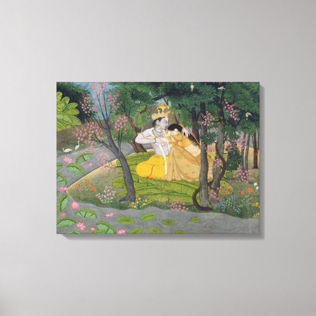 Radha and Krishna embrace in a grove of flowering Canvas Print (Front)