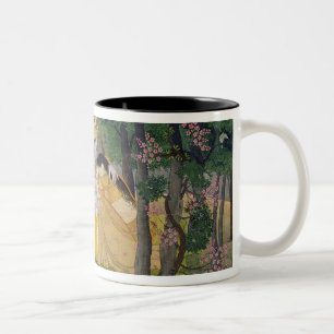 Radha and Krishna embrace in a grove of flowering Two-Tone Coffee Mug