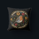 Radicalized by Basic Decency Birds lovers Cushion<br><div class="desc">Embrace the quiet rebellion of kindness with this beautifully illustrated design. Featuring a charming European Robin nestled among vibrant sunflowers, poppies, thistles, and delicate bluebells, this artwork blends vintage botanical charm with a powerful modern message. The bold text “RADICALIZED BY BASIC DECENCY” is a witty, sarcastic, and deeply resonant statement...</div>