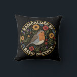 Radicalized by Basic Decency Birds lovers Cushion<br><div class="desc">Embrace the quiet rebellion of kindness with this beautifully illustrated design. Featuring a charming European Robin nestled among vibrant sunflowers, poppies, thistles, and delicate bluebells, this artwork blends vintage botanical charm with a powerful modern message. The bold text “RADICALIZED BY BASIC DECENCY” is a witty, sarcastic, and deeply resonant statement...</div>