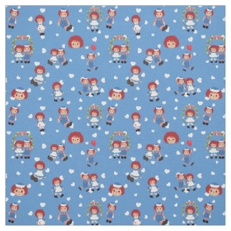 Raggedy Ann and Andy on Falling Hearts on Blue Fabric