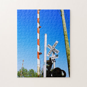 Railroad Crossing With Gate in Front of Mast Jigsaw Puzzle