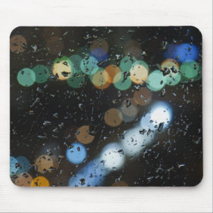 Rain drops on the window's glass mouse mat