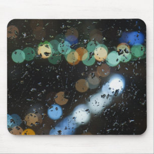 Rain drops on the window's glass mouse mat