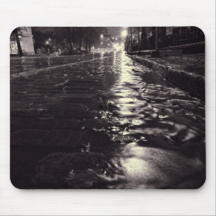 Rain water flowing on the streets of Helsinki Mouse Mat