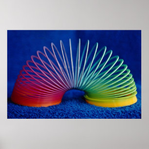 Rainbow-colored slinky toy poster