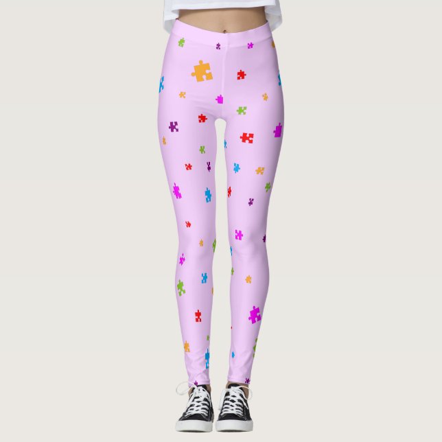 Rainbow Coloured Autism Puzzle Pieces on PINK Leggings (Front)