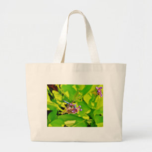 Rainbow coloured Dragonfly on a purple pink flowe Large Tote Bag